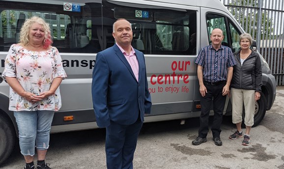 Cllr Kier Barbsy and staff of our centre stood in front of the Our Centre minibus