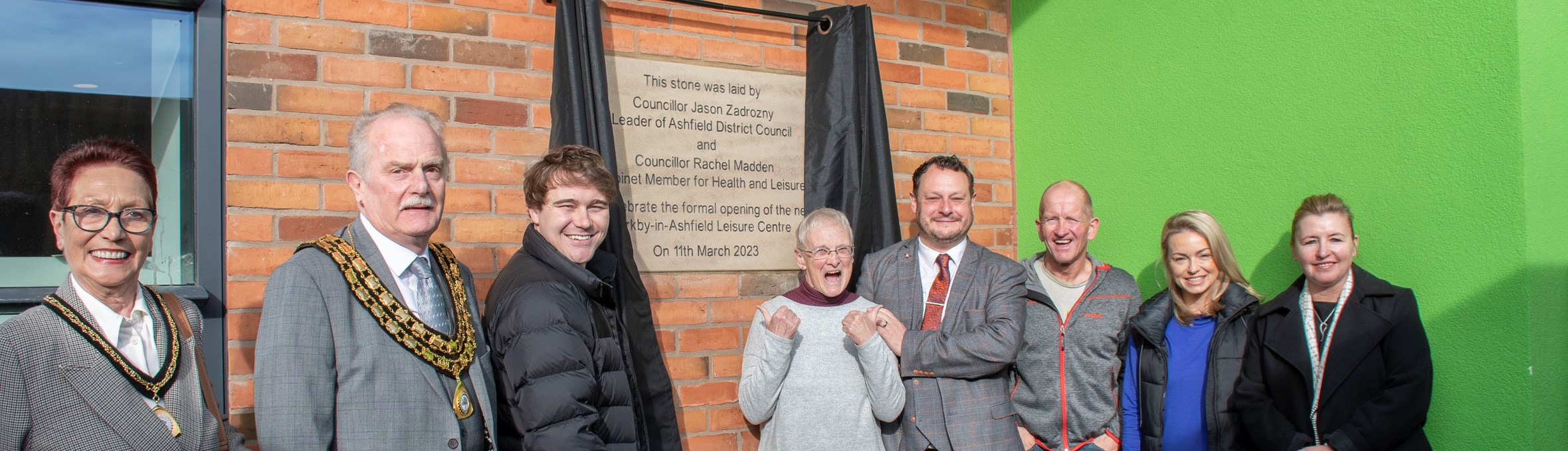 Invited guests unveil the opening plaque at Kirkby Leisure Centre