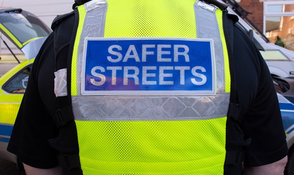 Protection Officer wearing a Safer Streets high-vis jacket 