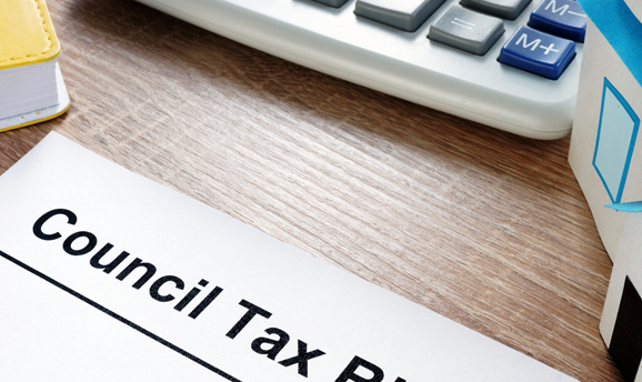 Council Tax Bill on a table with a calculator 