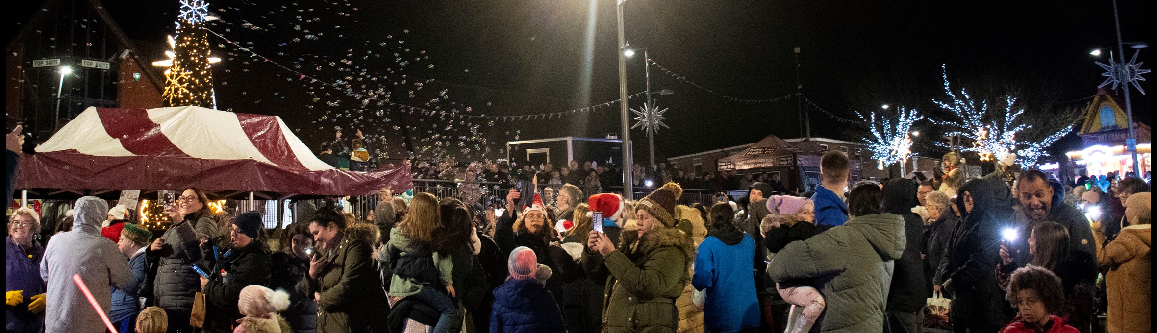Crowds gathered on Kirkby Plaza to watch the light switch on 