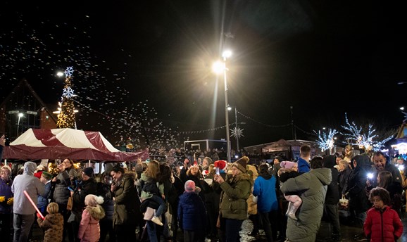 Crowds gathered on Kirkby Plaza to watch the light switch on 