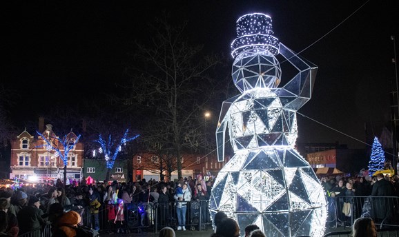 Crowds gathered around a giant LED snowman 